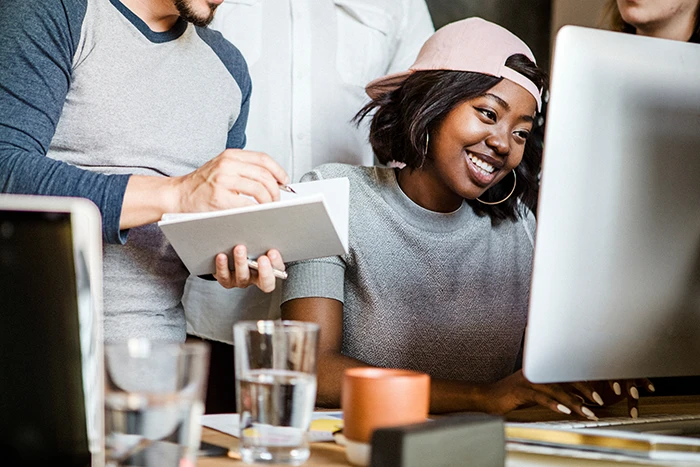 Community members connecting at a social hub meetup